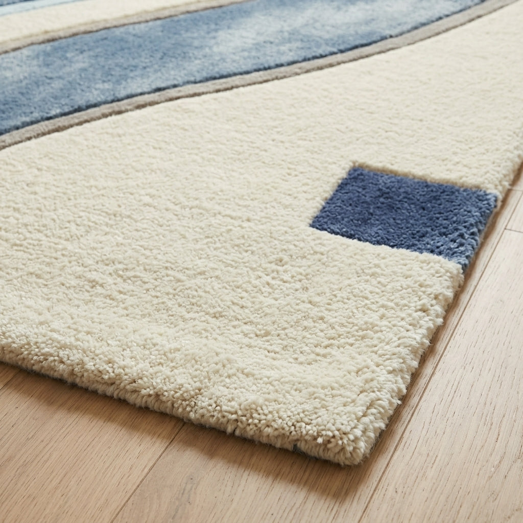 Denim Wave — Cream & Blue Soft Wave Rug — Edge binding detail